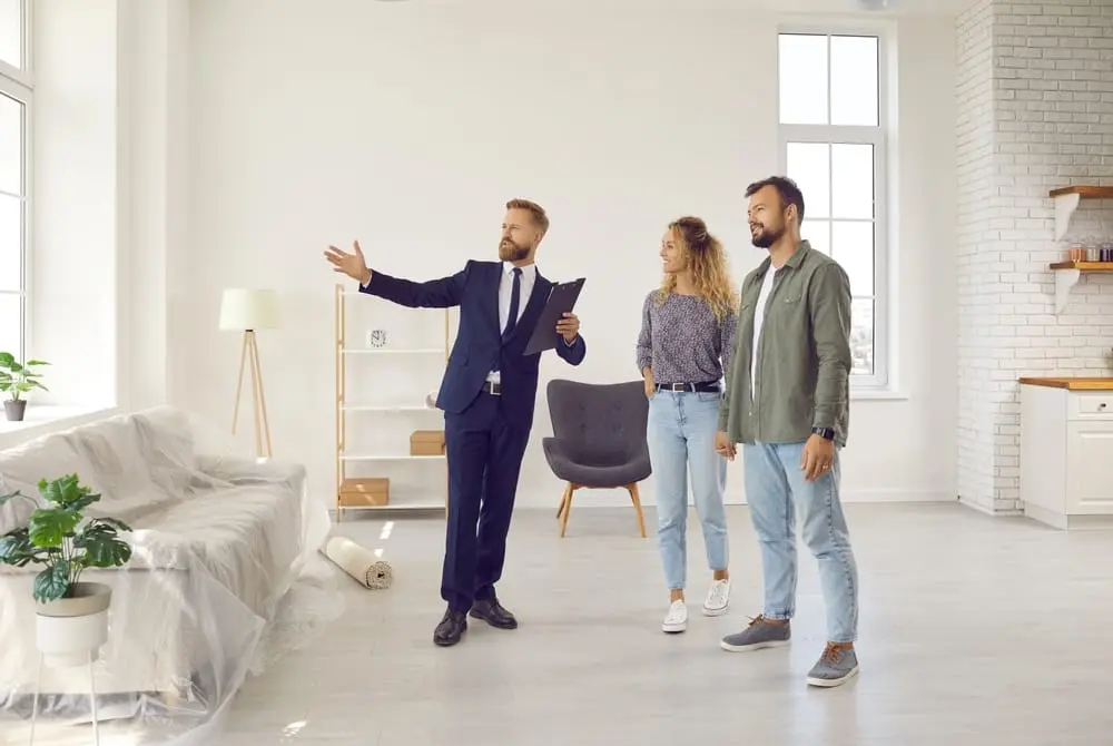 Property manager communicating with homeowners during community association meeting