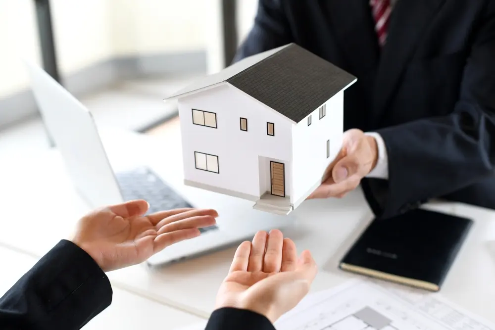 Property manager presenting single-family rental home model